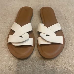 A. New. Day. white sandals - size 9